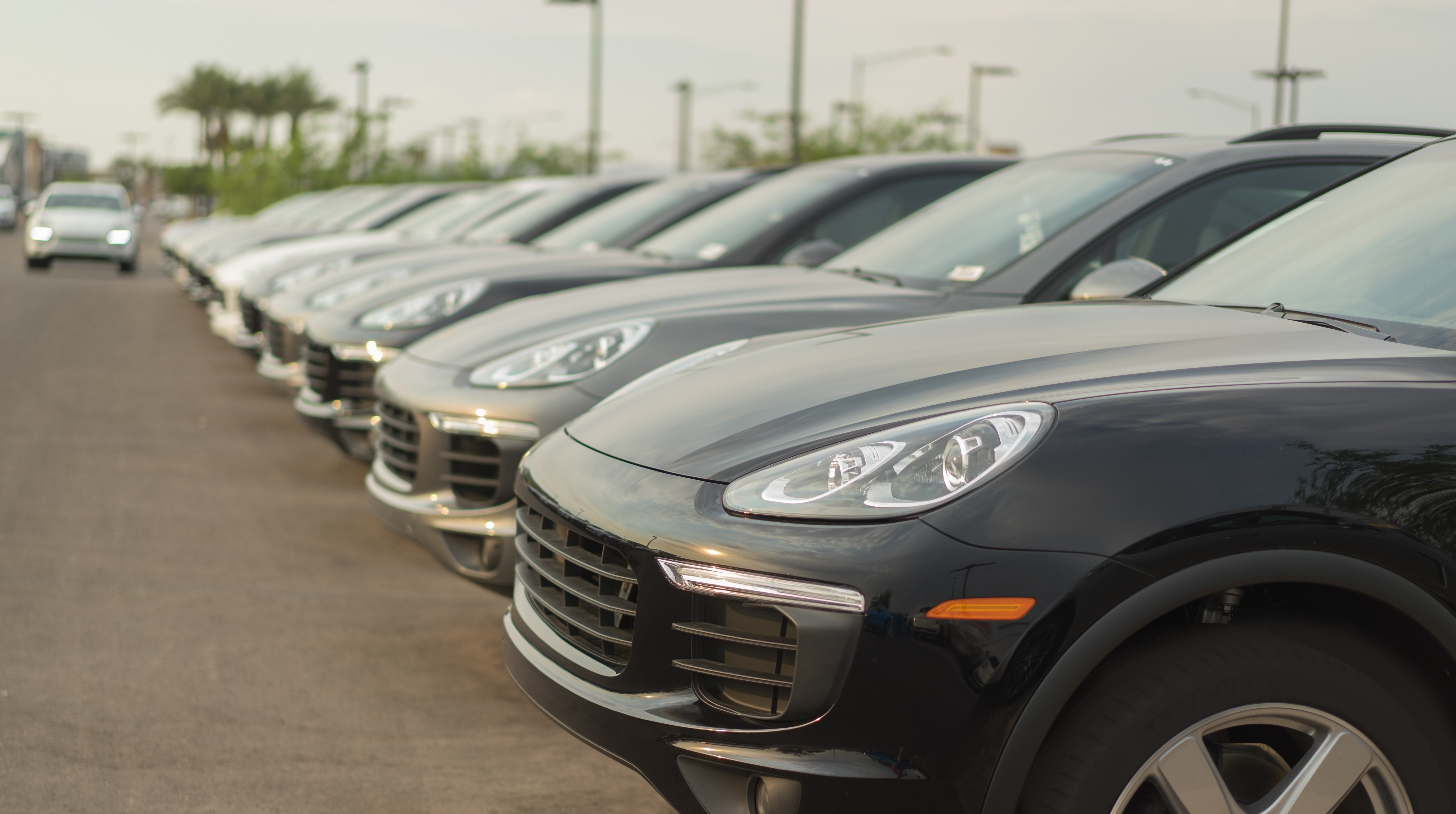 Luxury cars parked in a row